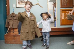 Two boys in dressing up clothes