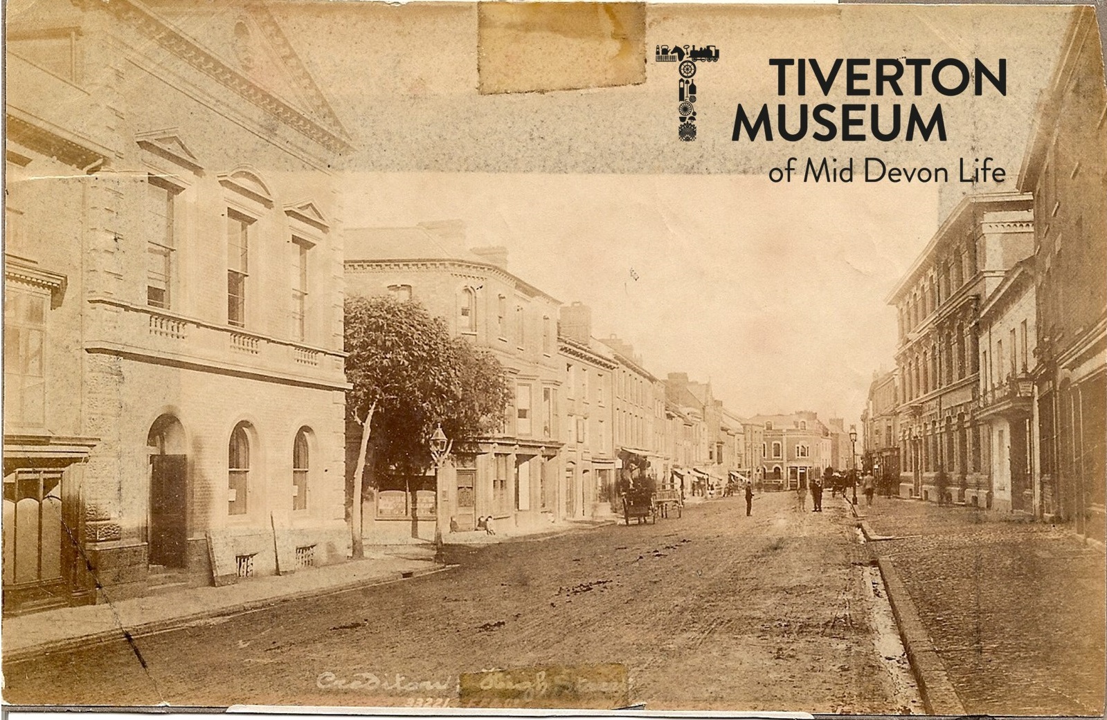 An old sepia photograph showing Crediton High Street