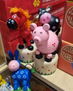 Colourful wooden push up toy animals