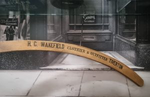 Wakefield's branded wooden coat hanger