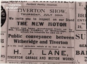 A newspaper clipping reading 'Tiverton Show Thursday July 30th. We invite you to inspect on our stand The New Motor which has been purchased from us by Mr. Thomas Tidball of Witheridge, and which he intends to use as a public conveyance between Witheridge and Tiverton. It is the most up-to-date vehicle of its kind on the market.' 