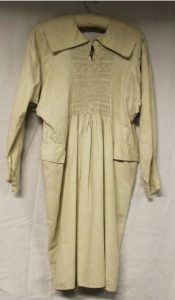 A long cream coloured smock